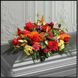 Coixí de flor variada